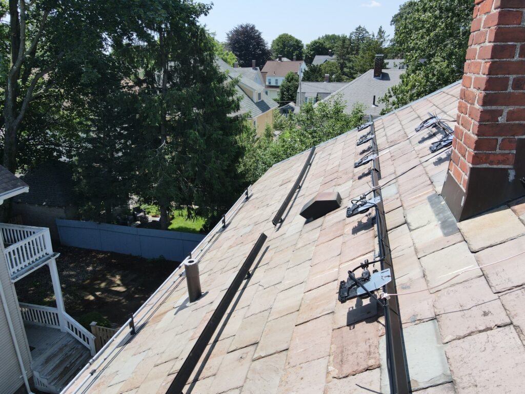 Slate-roof solar installation by Solar Slate Solutions — Medford, MA.