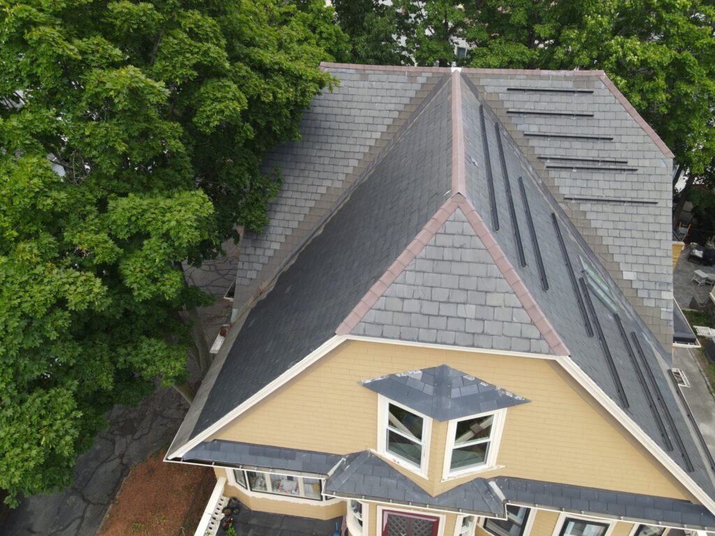 Slate-roof solar installation by Solar Slate Solutions — Somerville, MA.