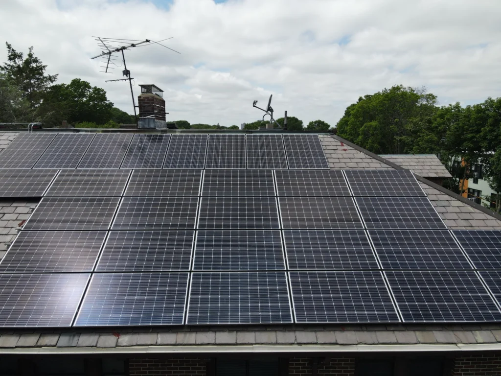 Aerial view of solar panels installed on a slate roof using the SlatePlate mounting system