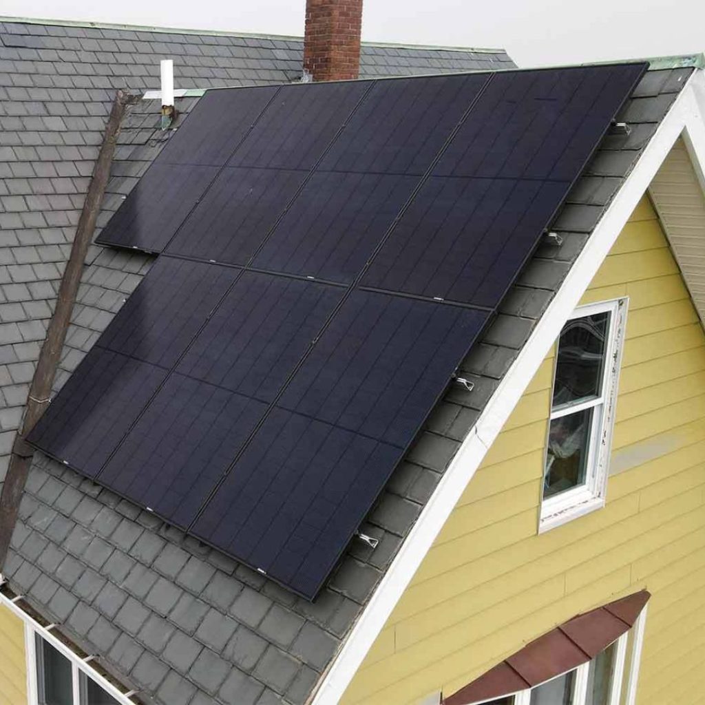 house with solar panels on roof